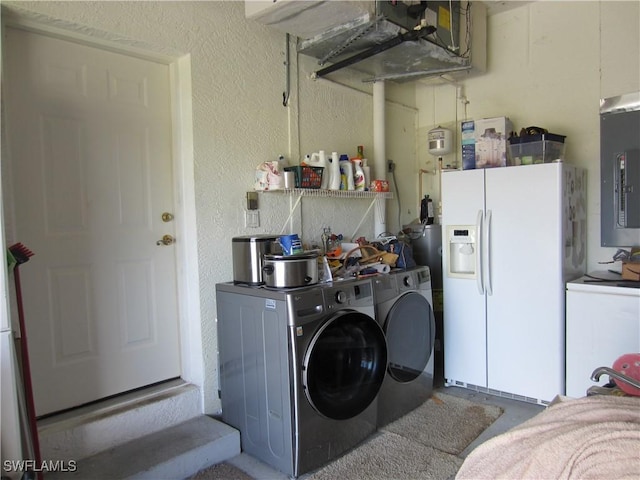620 Mirror Lakes Falls Ct, Lehigh Acres, FL 33974 - clothes washing area with cabinet space, electric panel, separate washer and dryer, and a textured wall