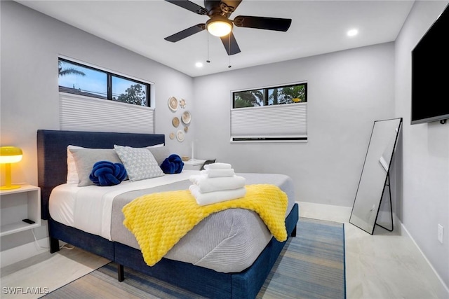 bedroom featuring ceiling fan, recessed lighting, and baseboards