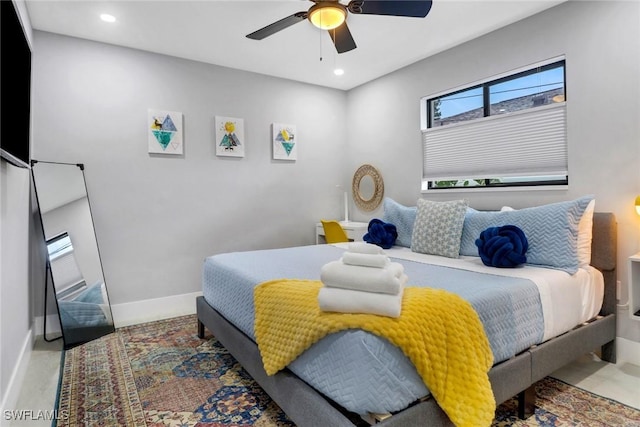 bedroom with baseboards, a ceiling fan, and recessed lighting