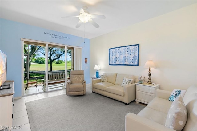 living room with tile patterned flooring and a ceiling fan