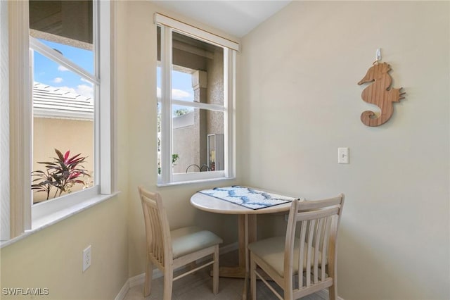 dining room featuring baseboards