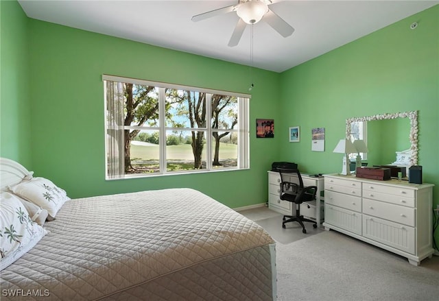 bedroom with ceiling fan and baseboards