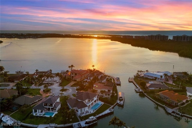 1091 Old Marco Ln, Marco Island, FL 34145 - aerial view at dusk featuring a residential view and a water view