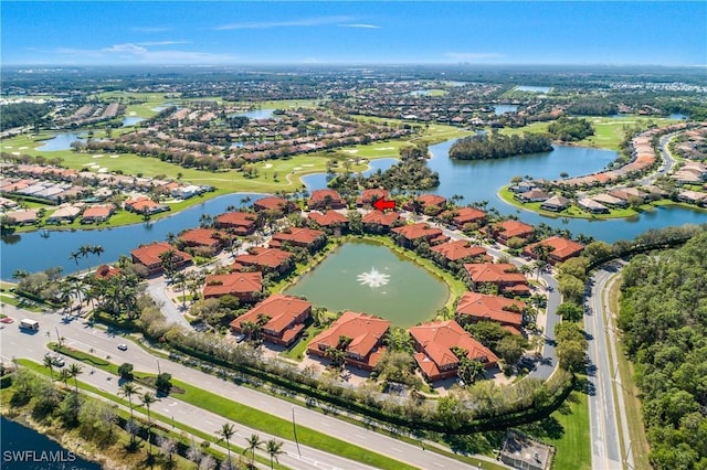 aerial view with a water view and a residential view