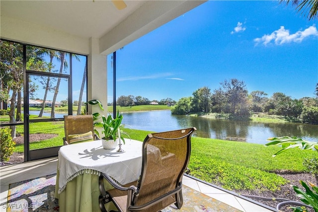 sunroom with a water view