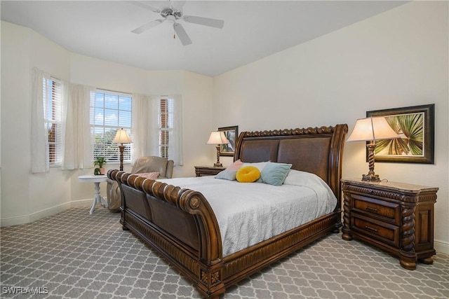 bedroom featuring carpet floors, baseboards, and a ceiling fan