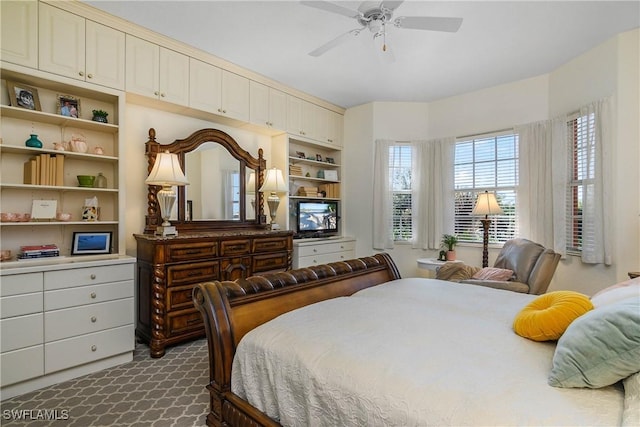 bedroom featuring carpet and a ceiling fan