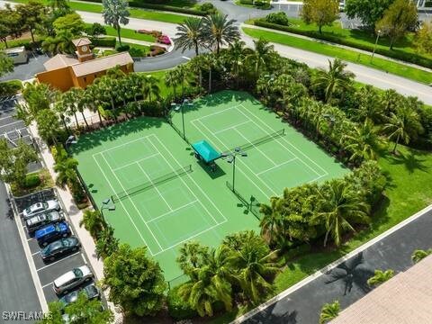 view of sport court featuring fence