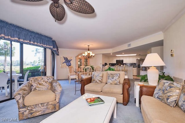 living area featuring an inviting chandelier, crown molding, and light colored carpet