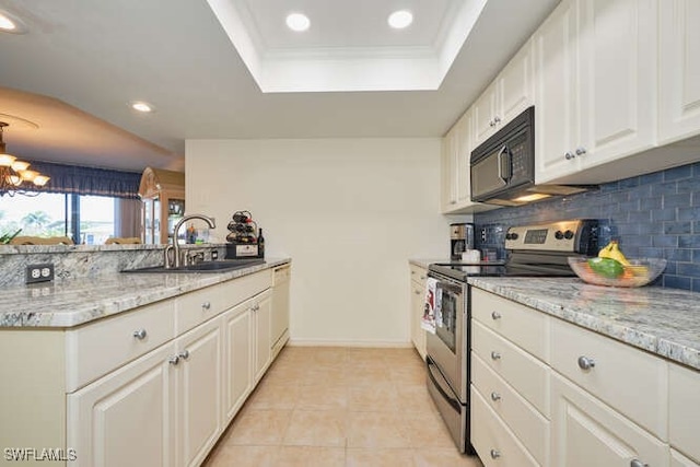 kitchen featuring a raised ceiling, dishwasher, stainless steel electric range, black microwave, and a sink