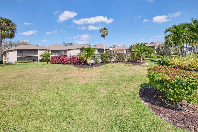 view of front of home featuring a front lawn