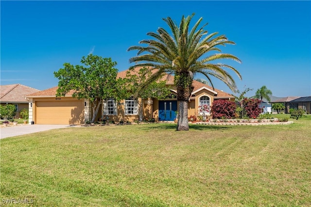 view of front of home with a garage, concrete driveway, and a front yard