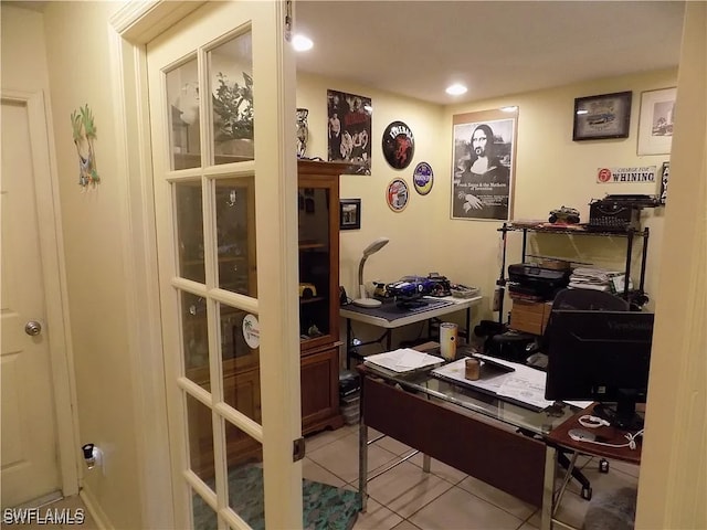 office with recessed lighting and light tile patterned floors