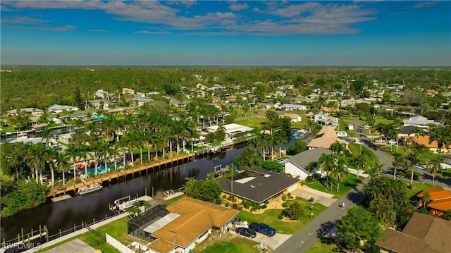 aerial view with a water view and a residential view