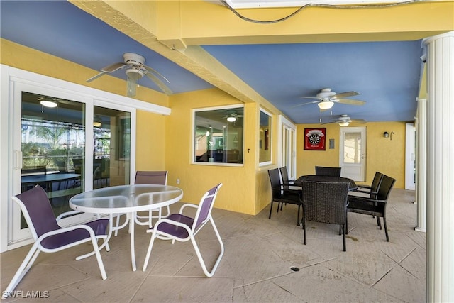 view of patio / terrace with outdoor dining space and a ceiling fan