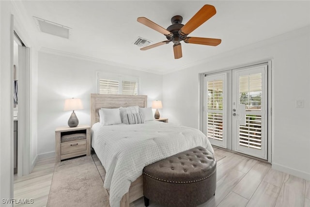 bedroom featuring baseboards, access to outside, visible vents, and crown molding