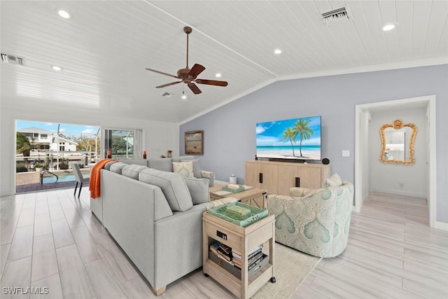 living area featuring baseboards, visible vents, vaulted ceiling, and recessed lighting