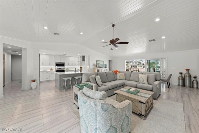 living room featuring vaulted ceiling, wooden ceiling, visible vents, and light wood-style floors