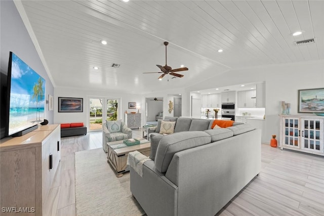 living room with lofted ceiling, wood ceiling, visible vents, and light wood finished floors