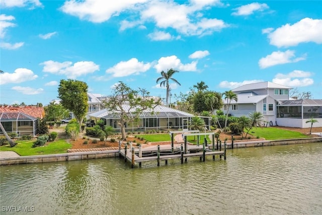 view of dock featuring a residential view, a lanai, and a water view