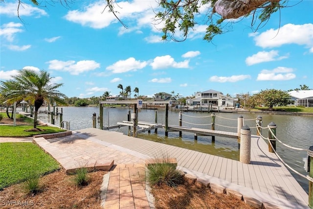 view of dock featuring a water view and boat lift