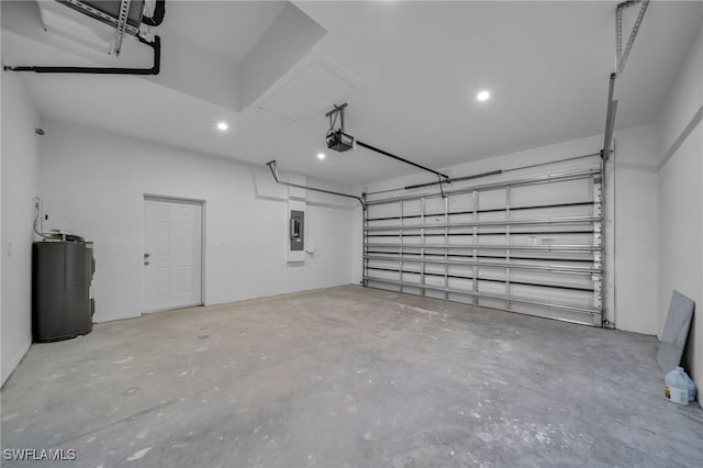 garage with a garage door opener, electric panel, and water heater