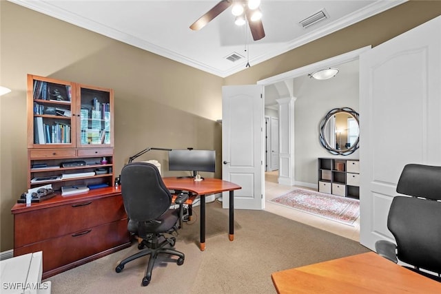 office area with visible vents, crown molding, carpet flooring, and decorative columns