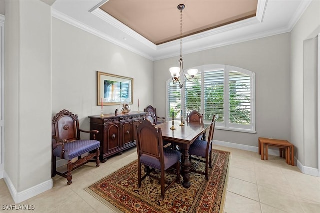 18191 Parkside Greens Dr, Fort Myers, FL 33908 - dining space featuring a raised ceiling, a chandelier, light tile patterned floors, crown molding, and baseboards