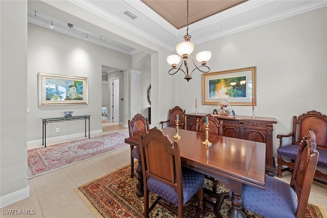 18191 Parkside Greens Dr, Fort Myers, FL 33908 - dining area with light tile patterned floors, a chandelier, baseboards, ornamental molding, and a tray ceiling