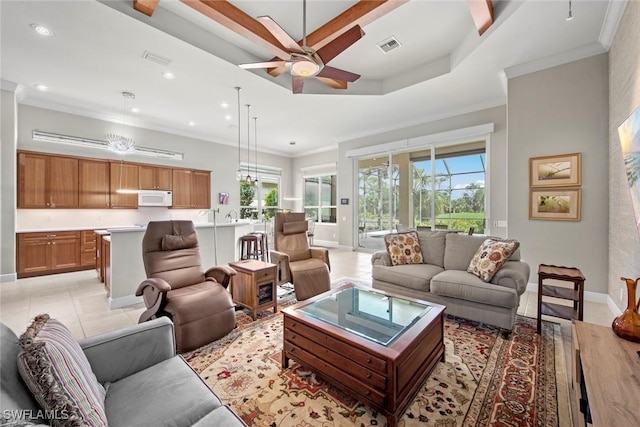 18191 Parkside Greens Dr, Fort Myers, FL 33908 - living area featuring healthy amount of natural light, recessed lighting, a ceiling fan, baseboards, and ornamental molding