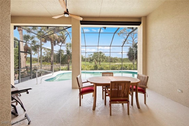 18191 Parkside Greens Dr, Fort Myers, FL 33908 - sunroom with a ceiling fan, a pool, and outdoor dining area