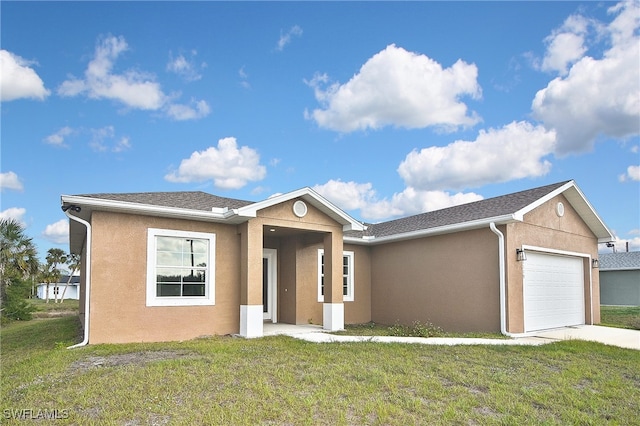 ranch-style home featuring an attached garage, a front yard, concrete driveway, and stucco siding