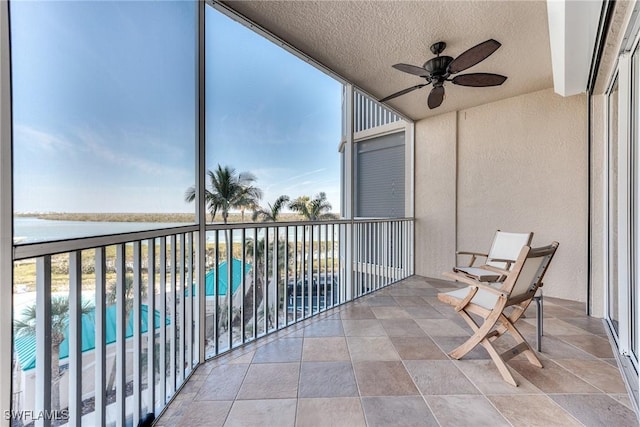 balcony featuring ceiling fan