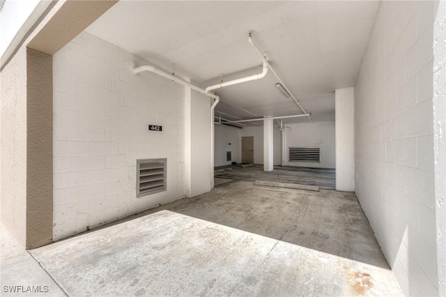 interior space featuring concrete block wall