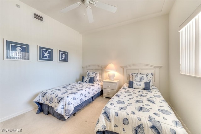 bedroom featuring a ceiling fan, carpet, visible vents, and baseboards