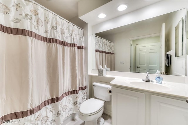 bathroom with toilet, curtained shower, recessed lighting, and vanity