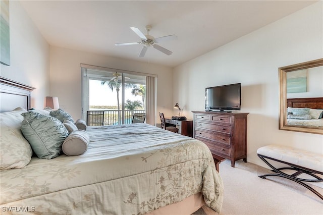 bedroom featuring access to exterior, a ceiling fan, and light colored carpet