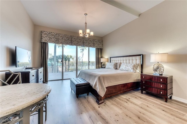 bedroom with light wood-type flooring, an inviting chandelier, access to outside, and lofted ceiling