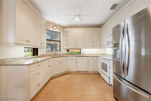 kitchen featuring white appliances, light tile patterned floors, visible vents, open shelves, and a sink