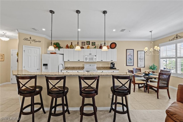 kitchen featuring ornamental molding, white appliances, visible vents, and light tile patterned floors