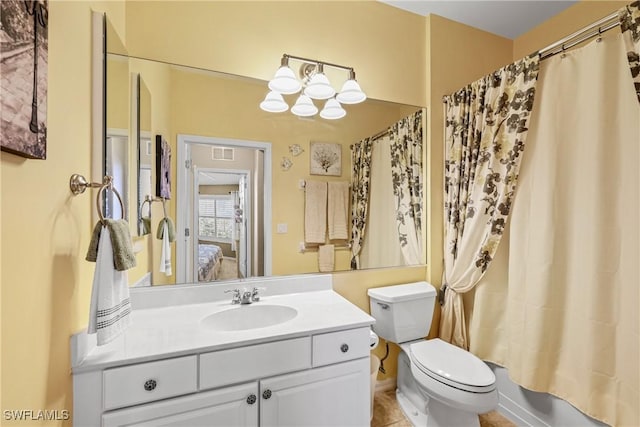 bathroom with ensuite bathroom, toilet, shower / tub combo, visible vents, and vanity