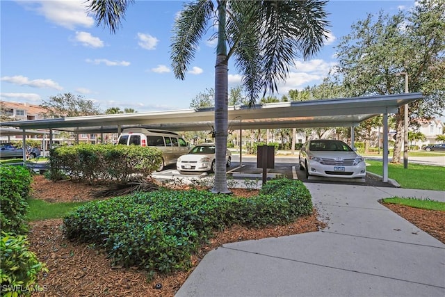 view of property's community with covered parking