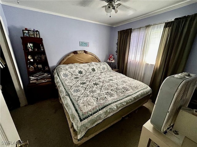 carpeted bedroom with crown molding and ceiling fan