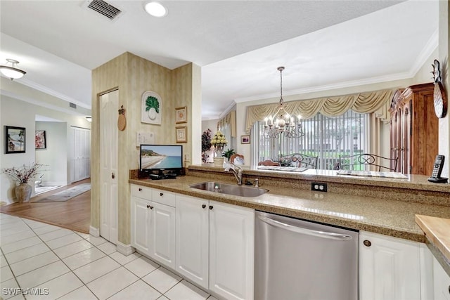 kitchen featuring light tile patterned flooring, a sink, visible vents, stainless steel dishwasher, and crown molding