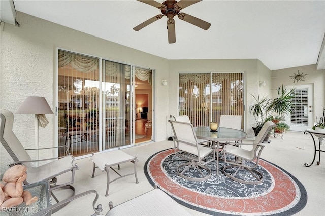 view of patio / terrace featuring ceiling fan and outdoor dining area