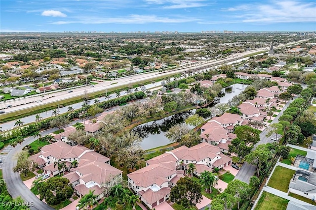 aerial view featuring a water view and a residential view