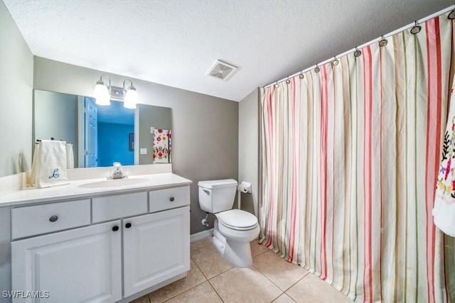 full bath with a textured ceiling, tile patterned flooring, toilet, vanity, and visible vents