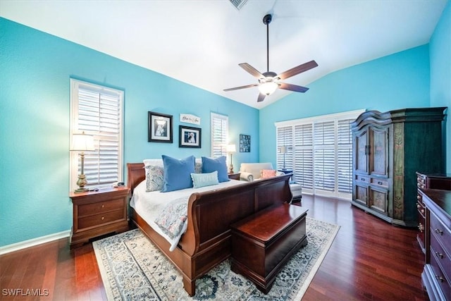 bedroom featuring vaulted ceiling, dark wood finished floors, baseboards, and ceiling fan