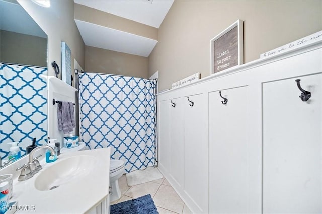 full bathroom with toilet, tile patterned flooring, a shower with shower curtain, and vanity