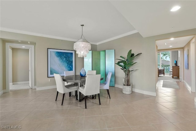 dining area featuring light tile patterned floors, a notable chandelier, baseboards, and crown molding